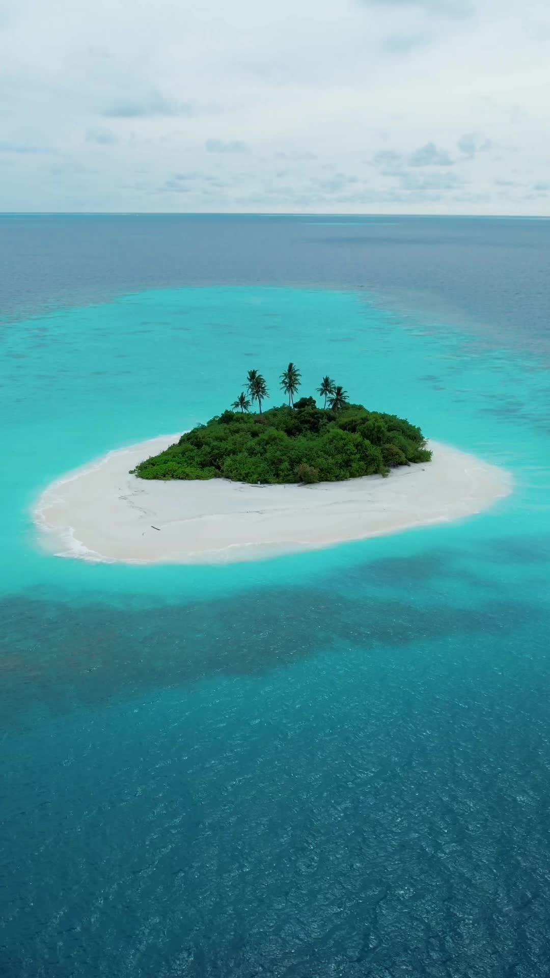 A slice of heaven in the middle of the sea.🌴🌊 📍Makunu Eri, Faafu Atoll * * * #maldives #visitmaldives #island #dji #djiglobal  * * @Visit Maldives