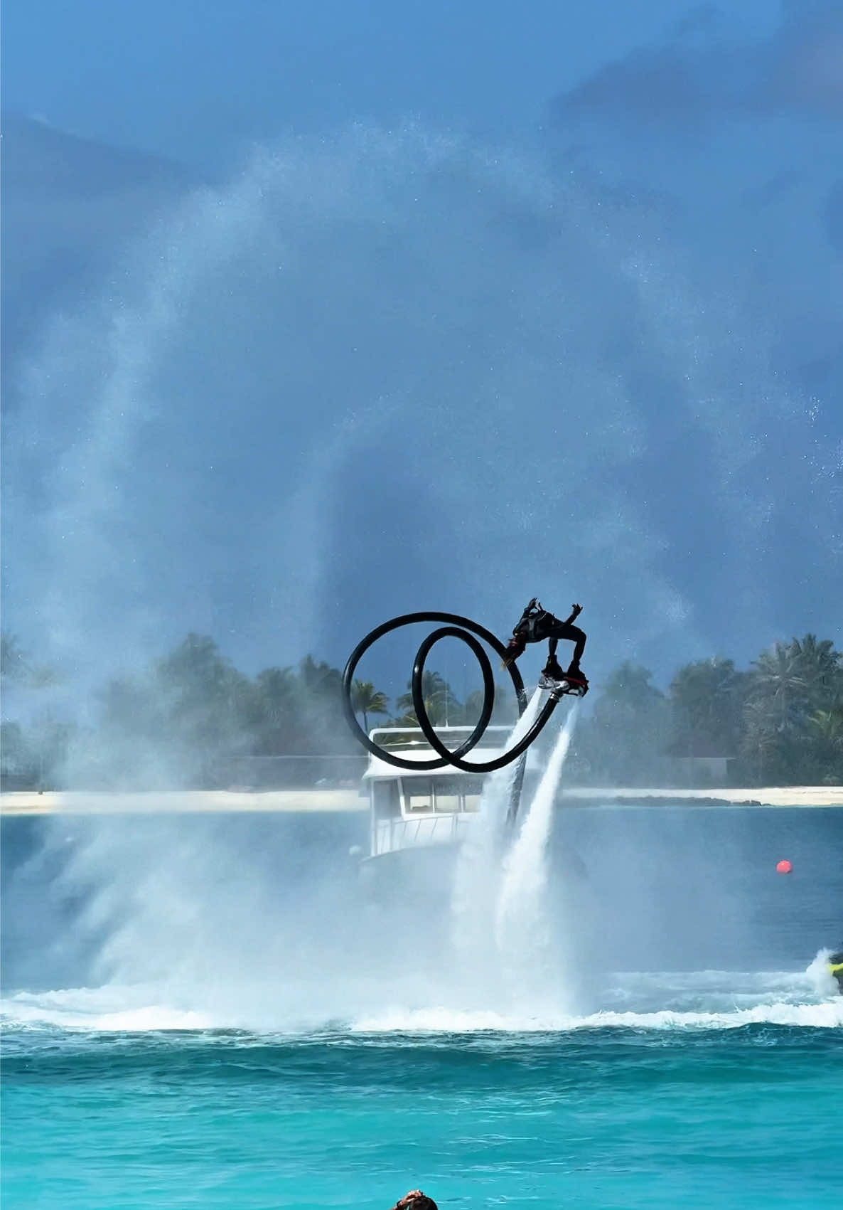 Flying over this blue water feels unreal. #zapataracing #flyboarding #hydroflight #fyp #watersports #foryou #wateractivities #vacation #maldives #resort #islandlife